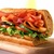 Footlong Turkey Breast and Black Forest Ham on Italian Bread with Provolone Cheese, Lettuce, Tomato, and Red Wine Vinaigrette